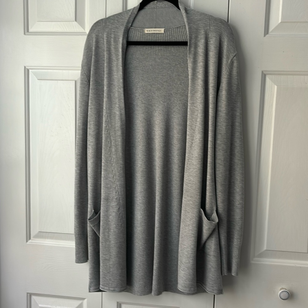 Long gray cardigan sweater by Retrology. Comfy and soft. Two pockets